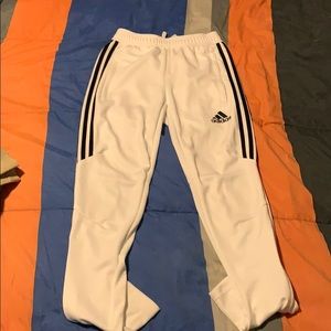 WHITE ADIDAS TRACK PANTS WITH BLACK STRIPES